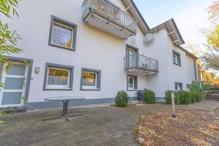 Menden Platte Heide – ETW im UG mit sep. Hauseingang, Terrasse, Garten & Carport