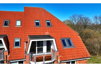 Wohnen wie im eigenen Haus: Lichtdurchflutete Maisonette mit USP und 180°-Schwerin-Panorama