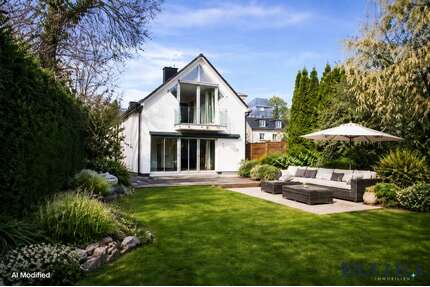 Haus zum Kaufen in Grünwald 1.390.000,00 € 165 m²