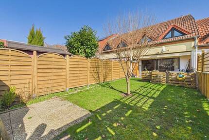 Charmantes Reihenmittelhaus mit Sonnenterrasse, Stellplatz und Garage in familienfreundlicher Lage - Bodenheim