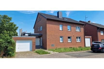 Zweifamilienhaus mit Garten, Balkon & Garagen im Beckumer Norden