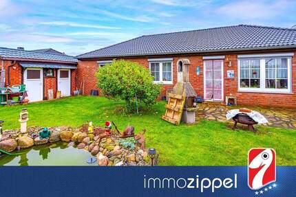 Am Feldrand in Podelzig: Klinker-Bungalow Bj.2000, 4 Zi.,G-WC, Masterbad, Kamin, Garage,648 m² Grdst