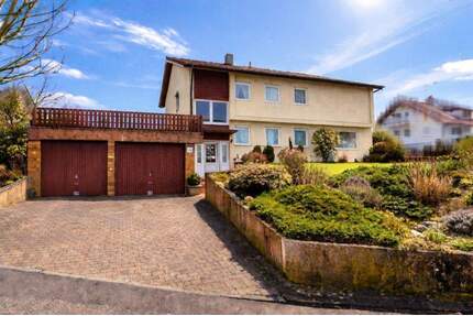 GLOBAL INVEST SINSHEIM | Tolles freistehendes Einfamilienhaus mit Einliegerwohnung und Doppelgarage in Grombach - Bad Rappenau / Grombach