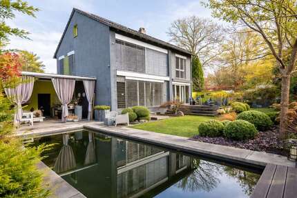 Haus zum Kaufen in Roth 1.150.000,00 € 240 m²