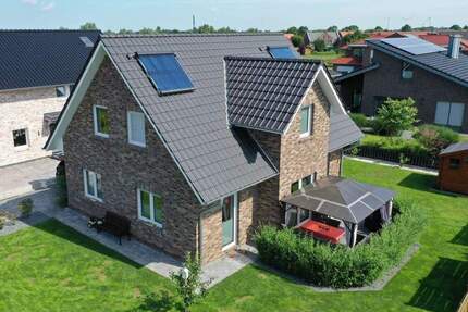 Landhaus mit Kapitänsgiebel in Roffhausen - Schortens
