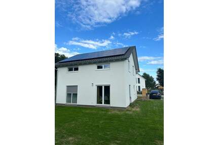 Passivhaus bei Kremmen, 14 kWhm2 einziehen, wohlfühlen