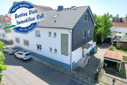 DIETZ: Gut geschnittenes 2-Familienhaus mit Garten, Garage und Nebengebäude in Babenhausen Langstadt