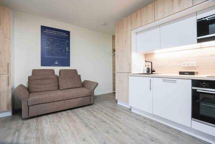 Achtung: Erstbezug! Mitten im Zentrum von Neusäß - Gartenwohnung + Tiefgaragenstellplatz