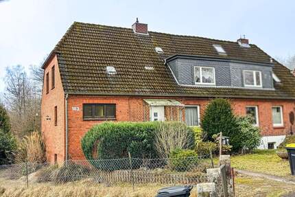 Kiel-Kroog - Doppelhaushälfte mit viel Potential in Sackgassenlage mit großem Grundstück