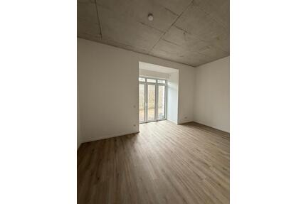 Exklusive Neubau Erdgeschosswohnung in zu Wohnraum umgebauter Kirche in Rheinberg-Orsoy zu vermieten!