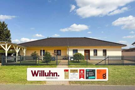 Außergewöhnliches ebenerdiges Zweifamilienhaus auf wunderschönem Grundstück mit Pool und Erdwärme - Löbnitz