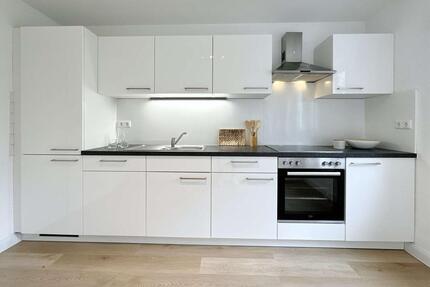 Erstbezug nach Sanierung: Moderne 2-Zimmer-Wohnung mit Terrasse, Einbauküche & PKW-Stellplatz - Admannshagen-Bargeshagen