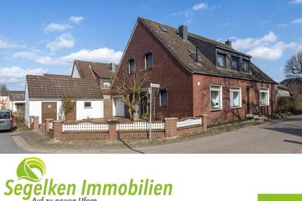 Ein- bis Zweifamilienhaus mit zwei Garagen, Carport und großem Garten - Stuhr Brinkum