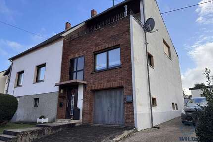 Haus zum Kaufen in Heusweiler Holz 269.000,00 € 208.6 m² - Heusweiler / Holz