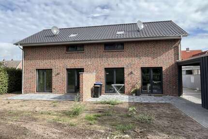 Haus zum Kaufen in Edewecht 389.000,00 € 94 m²