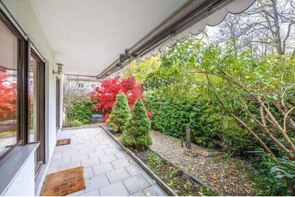 AIGNER - Charmante Erdgeschosswohnung am Athener Platz: Wohnen auf einer Ebene mit privater Terrasse - München Untergiesing-Harlaching