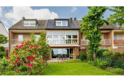 Großzügiges Reihenmittelhaus mit Einliegerwohnung, Wintergarten und Blick ins Grüne in Köln-Zündorf