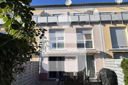 Familienfreundlich und modern...Reihenmittelhaus in Heroldsberg