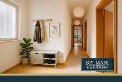 BRUMANI | Lichtdurchflutete 3-Zimmer-Wohnung mit Schwedenofen am Marktplatz - Sulzburg