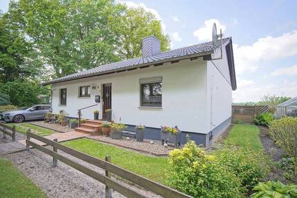 Volksbank Immobilien: Bungalow - Gemütlichkeit trifft auf Gartenidylle! - Loxstedt Stinstedt