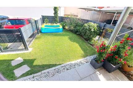 Exklusive neuwertige 4-Zimmer-Wohnung (KfW 55) in Feucht mit Garten