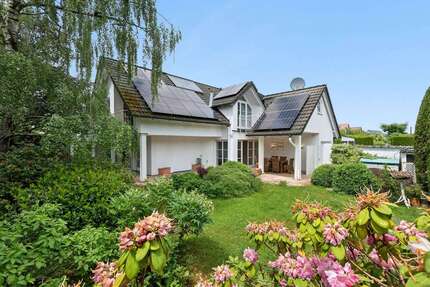 Haus zum Kaufen in Grünwald 1.850.000,00 € 205.57 m²