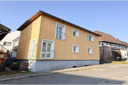 Modernes Wohnen im Zweifamilienhaus mit Nebengebäude - im historischen Ortskern von Ettlingenweier