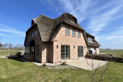 Ansprechende Neubau-Doppelhaushälfte unter Reet - Dunsum