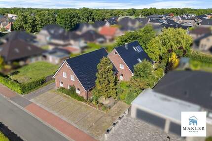 Wohnen und Arbeiten auf hohem Niveau~EFH mit vielseitig nutzbarem Praxisbereich in Westoverledingen