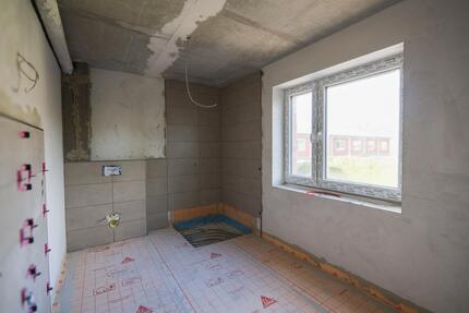 Stilvolle 3-Zimmer-Wohnung im Neubau, 1. OG – Aufzug, Balkon & Ortskernlage - Uplengen