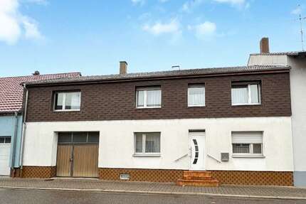 Haus zum Kaufen in Oberhausen-Rheinhausen 317.000,00 € 150 m²