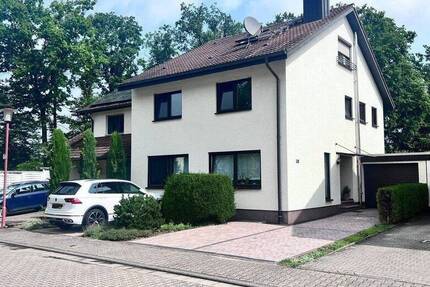 CHARMANTE DOPPELHAUSHÄLFTE IN BEGEHRTER LAGE DER HARDWALDTSIEDLUNG OFTERSHEIM