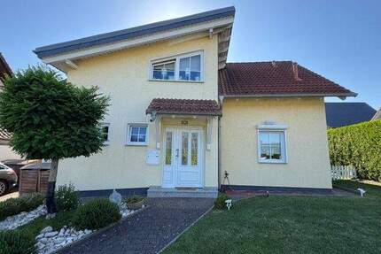 Charmantes Einfamilienhaus mit Galerie und liebevoll angelegtem Garten - Immenhausen Holzhausen