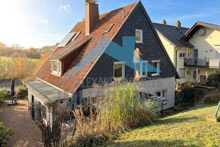 Freistehendes Einfamilienhaus mit Einliegerwohnung in ruhiger Lage von Edermünde-Grifte! - Edermünde / Grifte