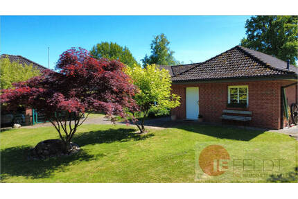 Idyll am Rande Hamburgs: Ebenes Wohnhaus mit wertiger Ausstattung, Carport + Garten mit Ausblick - Kattendorf