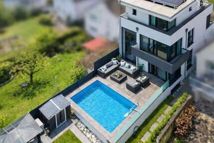 Haus zum Kaufen in Langen (Hessen) 2.000.000,00 € 292 m²