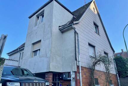 Investieren mit Weitblick: 3 vermietete Wohneinheiten plus Nachbarhaus im Angebot in FB-Fauerbach - Friedberg