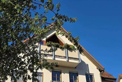 Über den Dächern von Leegebruch: Stilvolle Familienwohnung mit zwei Sonnenbalkonen