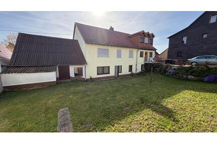 Einfamilienhaus mit Nebengebäuden, separater Einliegerwohnung und - Guldental