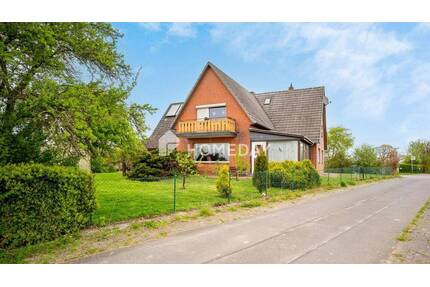 Zweifamilienhaus mit ca. 300 m² Wohnfläche, Gartenidylle und vielseitigen Nutzungsmöglichkeiten - Rethwisch