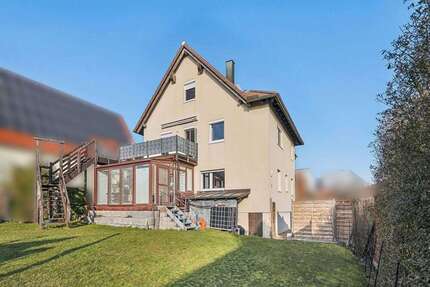 Haus zum Kaufen in Waldbüttelbrunn 649.000,00 € 245 m²