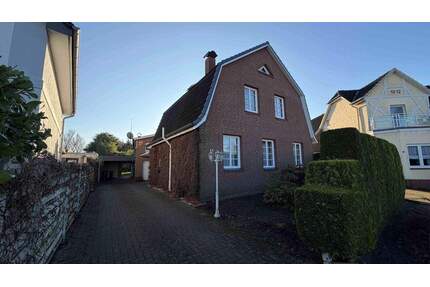 Viel Potenzial in Tornesch! Einfamilienhaus mit Teilkeller und Garage