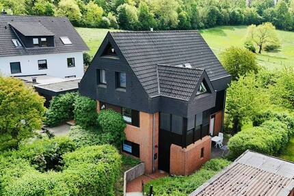 Einfamilienhaus mit Einliegerwohnung und naturnahem Grundstück in gefragter Lage von Moringen
