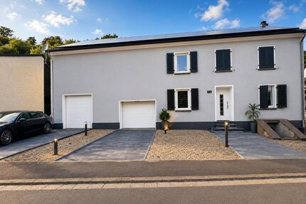 Mehrfamilienhaus mit Platz für Familie, Hobbys und Erfolg. - Merzig