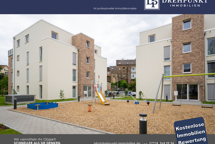 Neuwertige 2-Zimmer-Wohnung mit Balkon, Stellplatz und Einbauküche in zentraler Lage - Germersheim