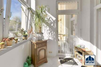 Sonnige Hochparterrewohnung mit charmantem Wintergarten und Gartennutzung - Schwerin Weststadt