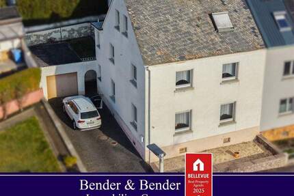 Solides Zweifamilienhaus mit Garagen und Garten -ideal für Generationenwohnen in Elz!