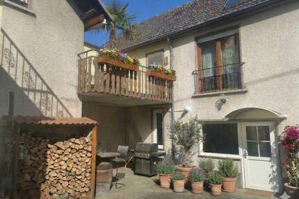 Einfamilienhaus mit Hof, Garten und 4 Garagen in Mülheim-Kärlich zu verkaufen.