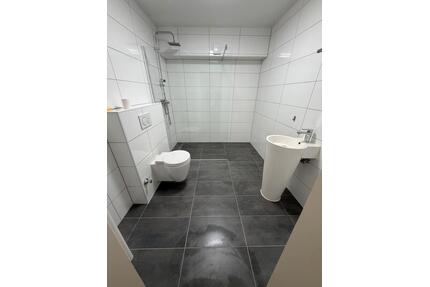 Schöne 2,5-Zimmer-Souterrainwohnung mit Terrasse 52 m² Vierlinden - Duisburg Walsum