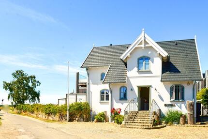 Ferienwohnung Ostwind auf Fehmarn - Meerblick, Kamin & Sauna